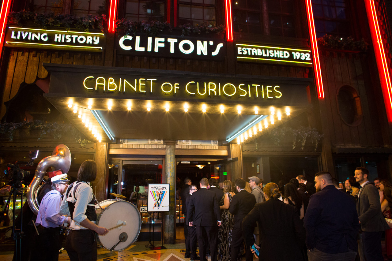 Tongies V attendees line up to get into Clifton's while the band plays